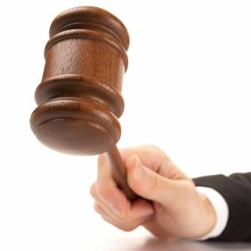 Automatic Stay Lifted Despite Debtors' Arguments Over Lawsuit Location